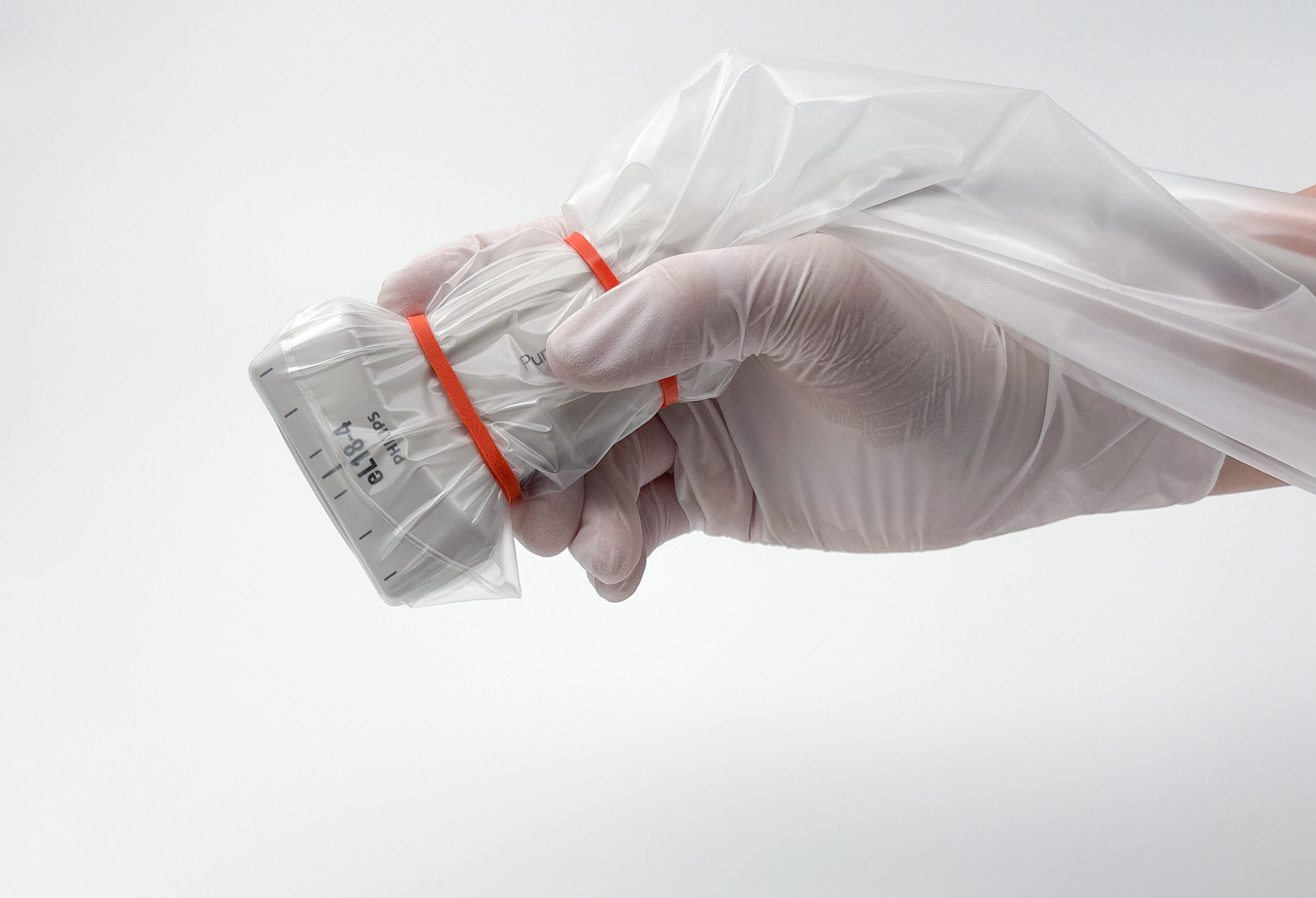Ultrasound transducer with cover and bands in hand